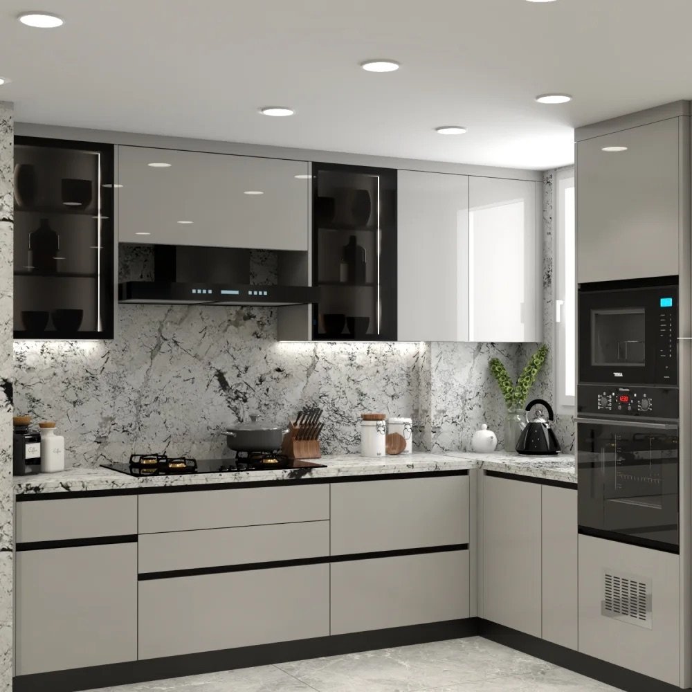 L-shaped modular kitchen in grey with a marble backsplash